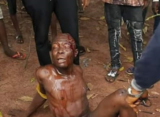 Photos: Man stripped, beaten and nearly killed for stealing Keke in Umuahia