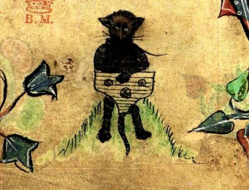 Gatto nero siede su un poggio,  con la bocca e una zampa tiene un topo e con l'altra  suona un salterio - Libro delle Ore - 1320 - 1330 - Inghilterra