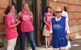 Abortion escorts in front of Planned Parenthood's Margaret Sanger Clinic on Bleecker St., New York, Aug. 22, 2015