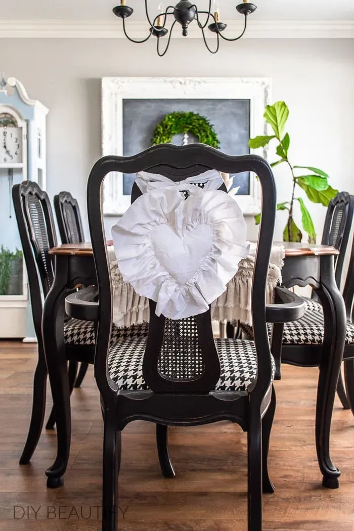 black chairs, white heart decor