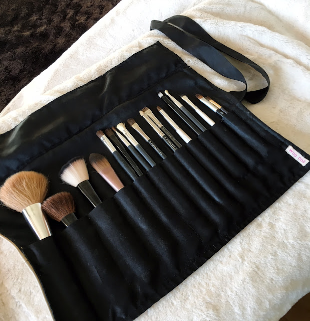 make-up brushes in a roll