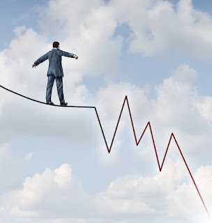 A Salesperson Trying to Find His Balance on a Tightrope of Downward Sales 