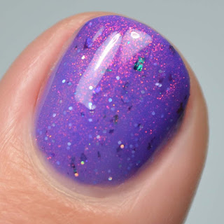 purple shimmer nail polish macro