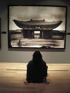 Crista meditating on a black and white photograph