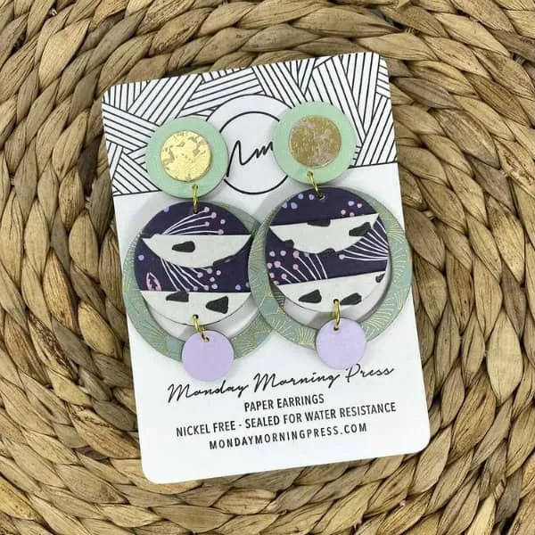 green, gold, navy, lavender, and white big, bold, circular patterned paper earrings