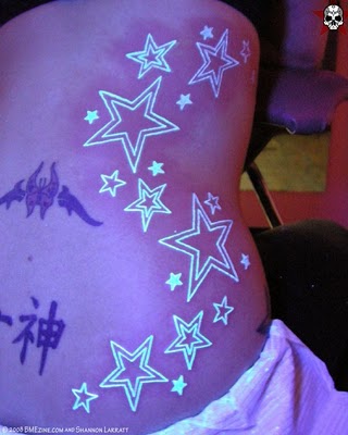 tattoo on girls side. tattoo on girls side. stars
