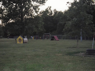 dog training equipment painted brightly in primary colors is visible at the John Douangdara Memorial Dog Park at South Sioux City's Freedom Park