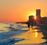 gulf shores vacation rental properties on beach at sunset