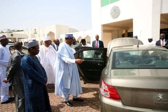 Buhari receives Peugeot car executives in Nigeria, inspects latest brands of Peugeot