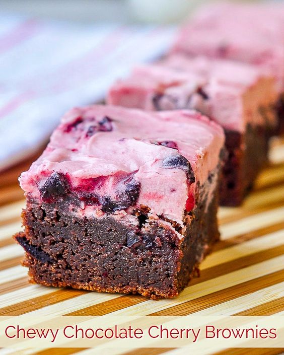 Chewy Chocolate Cherry Brownies - a chocolate and cherry explosion of flavour as chewy brownies get pieces of sweet cherries baked right in and even more in the delicious frosting.