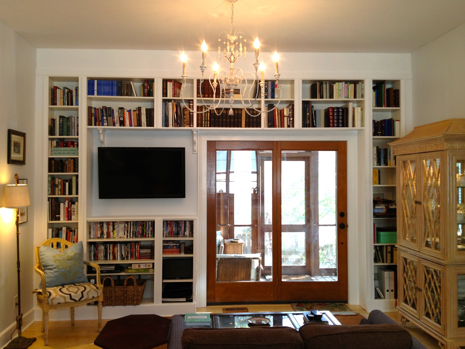 Here is the before photo of the seating area at one end of our kitchen  title=