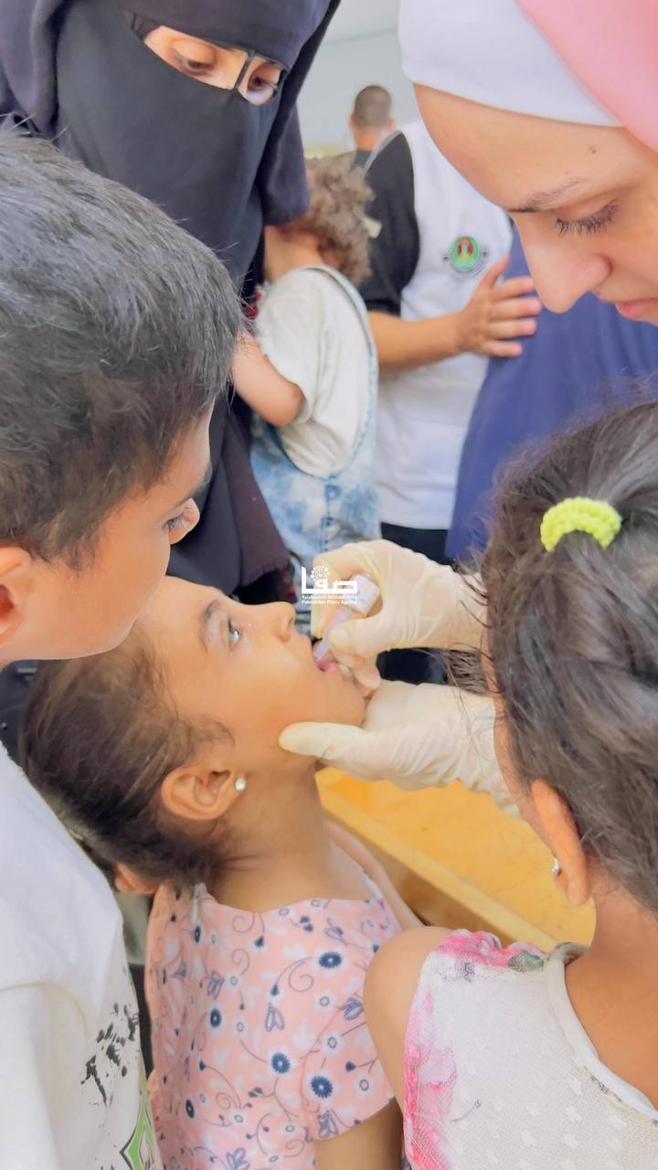 A child receives Polio vaccine during the third stage of Polio Vaccination Campaign inmGaza