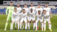 REAL MADRID C. F. Temporada 2020-21. Courtois, Sergio Ramos, Kroos, Varane, Fede Valverde, Benzema. Lucas Vázquez, Nacho, Mendy, Vinicius y Modric. REAL MADRID C. F. 3 ATALANTA BERGAMASCA CALCIO 1. 16/03/2021. Liga de Campeones de la UEFA, partido de vuelta. Valdebebas, Madrid, estadio Alfredo Di Stéfano. GOLES: 1-0: 34’, Benzema. 2-0: 60’, Sergio Ramos, de penalti. 2-1: 83’, Luis Muriel. 3-1: 85’, Marco Asensio.