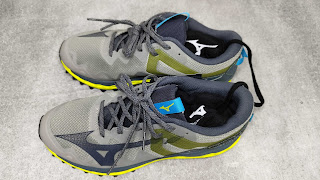 Putting the Mizuno Shoes Dryer P1GZ201809 on a pair of shoes