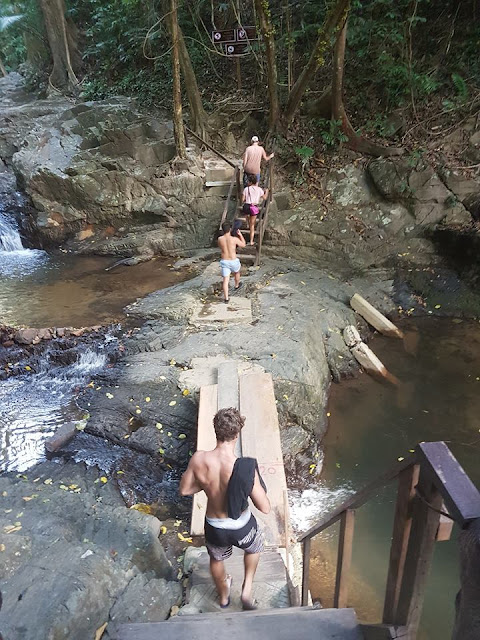 River crossing with broken pieces from previous bridges