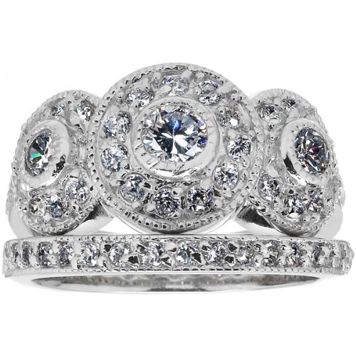 This a beautiful vintage wedding ring set and very sparkly. Got a lot ...