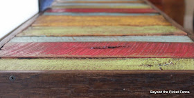 colorful rustic bench made with pallet wood and reclaimed wood http://bec4-beyondthepicketfence.blogspot.com/2014/04/colorful-rustic-bench.html