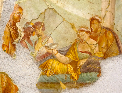 A detail of a fresco from Pompeii, a banquet scene