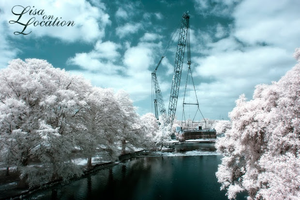 The 400-ton Submarine Theater is lifted out of Spring Lake at Aquarena Center, Texas State University-San Marcos. Infrared photo by Lisa On Location photography.