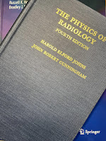 The Physics of Radiology, by Johns and Cunningham, superimposed on Intermediate Physics for Medicine and Biology.