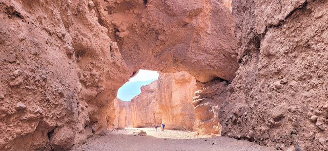 Father and Son walking towards the Natural Bridge