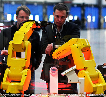 FANUC Robot Assembly Demo - The yellow robot arms dance through an assembly demo for Elon Musk and the rest of the tour group that visited the reopening of the former NUMMI plant, now Tesla Motors. photo credit by Steve Jurvetson