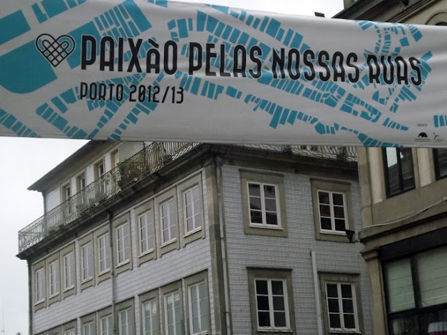 Faixa na rua sobre o evento Paixão pelas nossas ruas