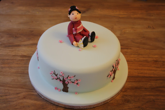 Japanese kimono decorated cake with cherry blossom trees