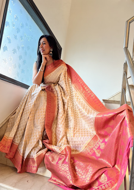 Pure katan silk. Sona Rupa butis. Coral border and pallu.