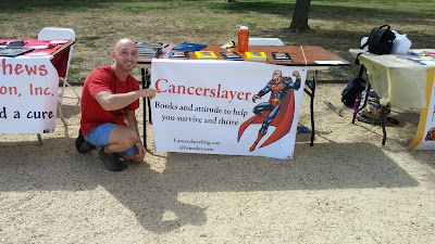 Benjamin Rubenstein at his Cancerslayer table at CureFest DC 2015 on the National Mall