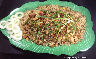 Rich fried rice with chicken and mixed vegetables