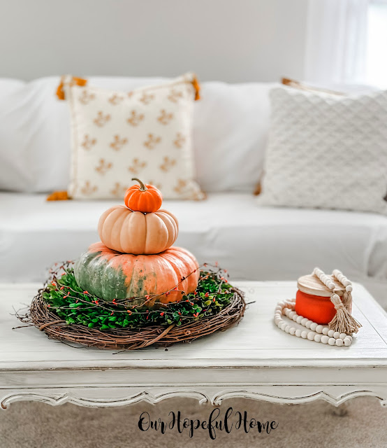 Cinderella pumpkin topiary on coffee table