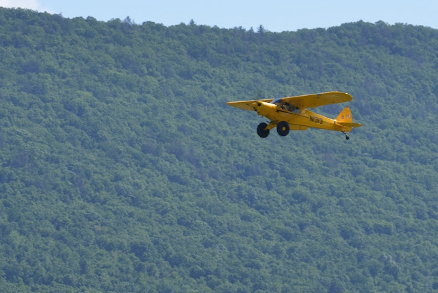 bright yellow Piper at the Sentimental Journey Fly-in