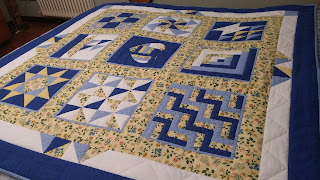 Sampler quilt blu, giallo e bianco