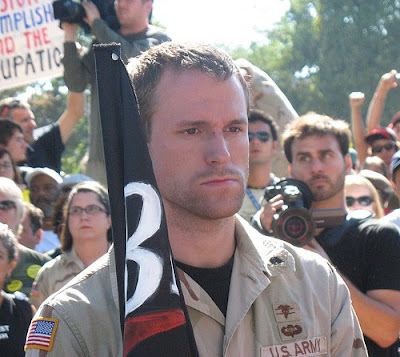 anti-war vet standing at attention