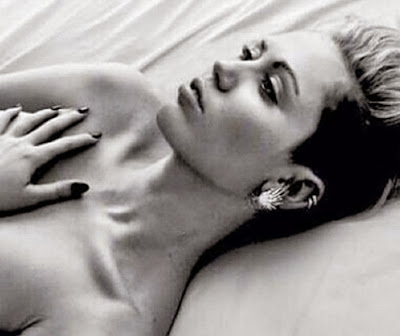 Miley Cyrus posts topless photo of herself on instagram