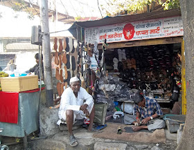 cobbler shop with cobbler