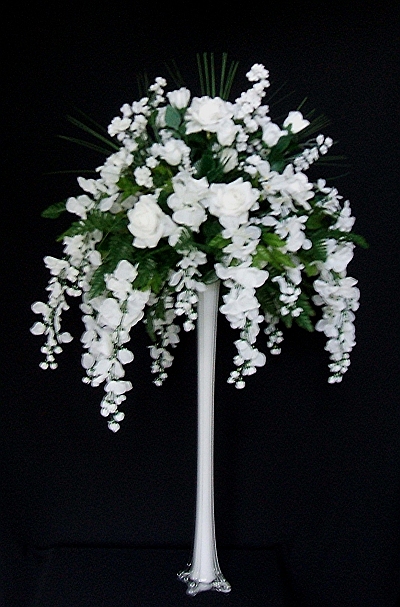 Frosted or colored glass vases help to hide the stem of the bush better 