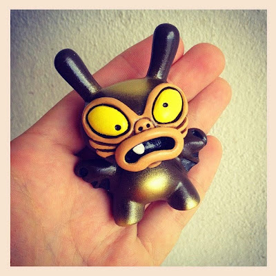 “Chocolate Brown and Gold” Baby Greasebat Dunny Resin Figure by Chauskoskis