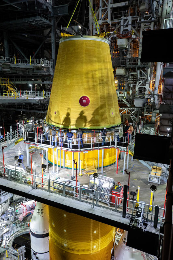 Inside the VAB at NASA's Kennedy Space Center in Florida, the LVSA is placed atop the SLS core stage booster...on June 22, 2021.