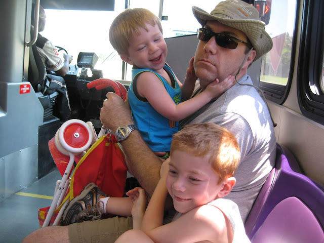 I photo of David Brodosi and his family on a bus at Disney