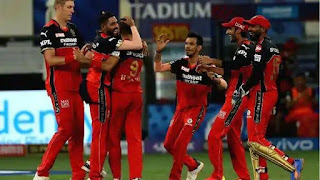 For RCB, Glen Maxwell was another hero in the match as after scoring a half-century (56), the Australian followed it by scalping two crucial wickets with the ball in hand. RCB skipper Virat Kohli also scored a half-century in the match.  Chasing the target of 166, Mumbai Indians had a brilliant start as their openers Quinton de Kock and Rohit Sharma frustrated RCB' bowlers throughout the first powerplay. The duo gathered 56 runs after the 6 overs in the match.  Yuzvendra Chahal provided the much-needed breakthrough for the RCB in the seventh over as he sent Quinton de Kock back to the pavilion at the score of 24. With spinners on both ends, MI felt the heat in the middle overs.  Glen Maxwell struck for RCB in the 10th over as he removed dangerous-looking MI captain Rohit Sharma. Sharma walked back after scoring 43 off 28 balls. In the very next over, Yuzvendra Chahal dismissed Ishan Kishan after MI batter mistimed a slog.  With runs in scarcity, wickets kept falling for MI as Glenn Maxwell struck again in the 14th over. The Australian all-rounder clean bowled Krunal Pandya for 5 off 11 balls. Mohammed Siraj joined the wicket-taking pack in the 15th over after he sent back Suryakumar Yadav (8 off 9) to the pavilion.  Harshal Patel dusted all hopes for MI in the 17th over of the match after he took an incredible hattrick. Patel removed Hardik Pandya, Kieron Pollard and Rahul Chahar for his hat-trick as defending champions suffered a stunning collapse.  Yuzvendra Chahal clinched his third of the match in the next over. Patel then removed Adam Milne in the penultimate over to wrap up MI's innings.  Earlier, Glen Maxwell and Virat Kohli starred with the bat as Royal Challengers Bangalore (RCB) posted a score of 165/6. For RCB, Glen Maxwell and Virat Kohli played innings of 56 and 51 respectively. K.S Bharat also played a crucial knock of 32 for the team in red. Jasprit Bumrah scalped three wickets while Trent Boult, Adam Milne, and Rahul Chahar returned with one wicket each for Mumbai Indians.  Put in to bat first, RCB had a decent start as they end up scoring 48 runs in the first six overs with the loss of one wicket. Jasprit Bumrah got the wicket of Devdutt Padikkal in the powerplay while bowling the second over. RCB batter edged to Quinton de Kock. Virat Kohli along with K.S Bharat strengthen RCB innings as the duo soon raced towards 51 run partnership in 31 balls. Rahul Chahar provided the much-needed breakthrough for MI in the 9th over as Bharat walked back for 32 off 25 after getting caught at deep cover. Glen Maxwell then joined the RCB skipper on the pitch and the duo stabilised the innings of the team in red. Virat Kohli continued with his carnage and brought up his second consecutive IPL half-century in the 15th over of the innings. But the RCB skipper was not able to profit from the good start as he walked back to the pavilion in the very next over after getting caught on deep. Adam Milne sent Kohli to the dressing room after a fine inning of 51 off 42 balls.  Maxwell then scored his fifty in the 18th over of the match - off just 33 balls -which included three sixes. Bumrah who was bowling penultimate over removed dangerous-looking Glen Maxwell and AB de Villiers on two consecutive deliveries. Glenn Maxwell returned to the pavilion after scoring 56 off 37 balls.  Shahbaz Ahmed was the last RCB player to get out after he was bowled by Trent Boult in the last over. RCB's innings ended on 165/6. Brief Scores: Royal Challengers Bangalore 165/6 (Glen Maxwell 56, Virat Kohli 51; Jasprit Bumrah 3-36, Trent Boult 1-17) vs Mumbai Indians(Rohit Sharma 43, Quinton de Kock 24; Harshal Patel 4-17, Yuzvendra Chahal 3-11.)