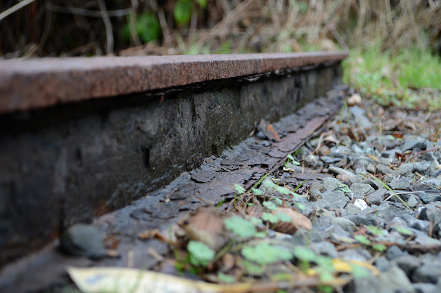 railroad segment flaking into nothing