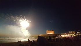 Fireworks off the headland at the Fistral Night Surf 2017