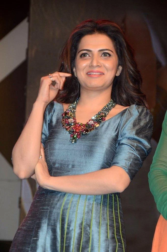 Tamil TV Anchor At Audio launch In Blue Dress Dhivyadharshini