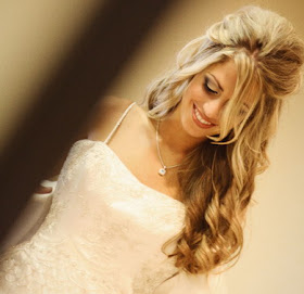 Romantic wedding hair styles include loose chignons, half updos