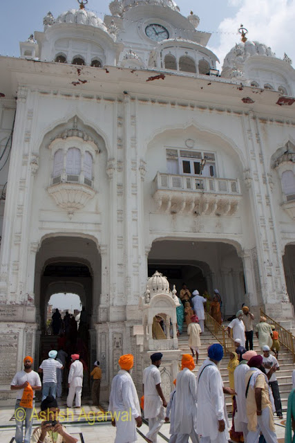 People going and coming though the main entrance to the Golden Temple complex in Amritsar