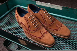 A Pair of Brown Brogue Leather Shoes