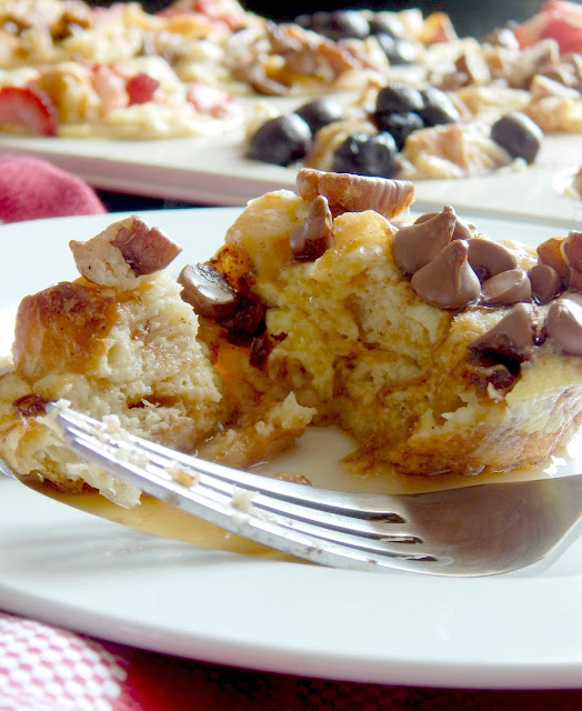 Croissant French Toast Cups...the hit at your next brunch or breakfast!  Croissants are soaked up in a delicious custard then topped with an array of toppings - blueberries, strawberries or chocolate chips and pecans. (sweetandsavoryfood.com)