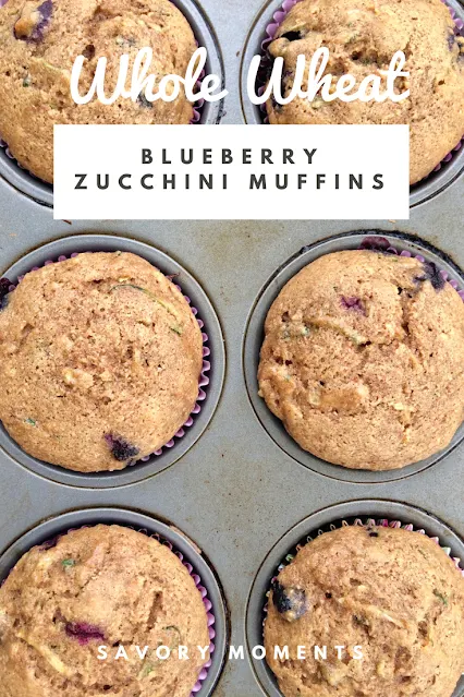 Muffin tin with baked whole wheat blueberry zucchini muffins.